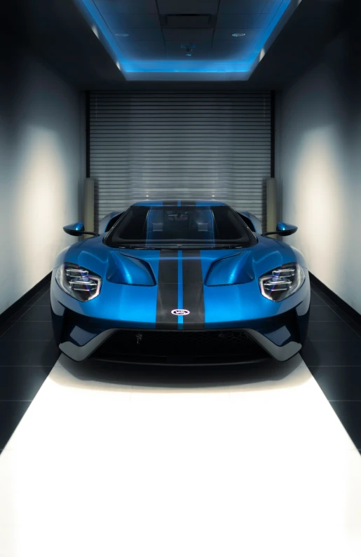 blue and black sports car parked inside of a garage