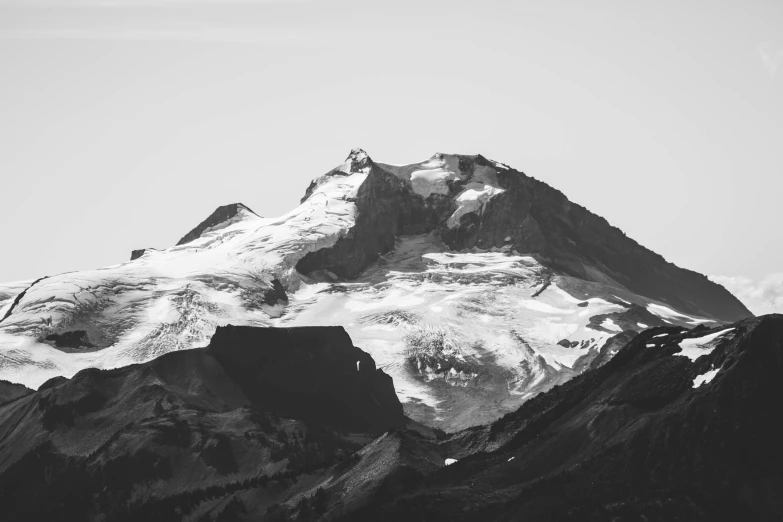 a very tall mountain with a sky background