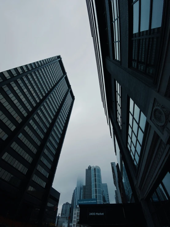 two buildings that have windows on the top of them