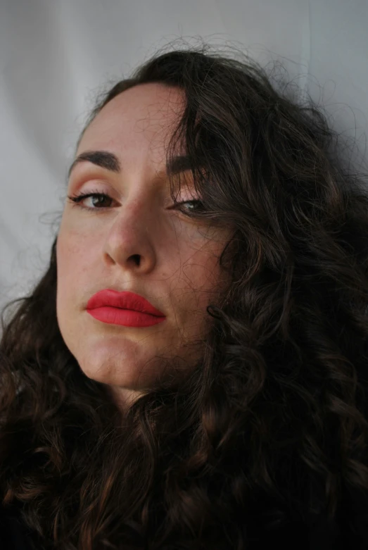 close up of a young woman with wavy hair