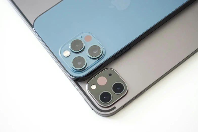 a closeup image of an iphone and a camera