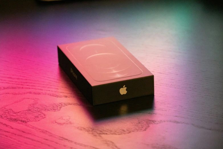 an apple product is displayed with blurry colors