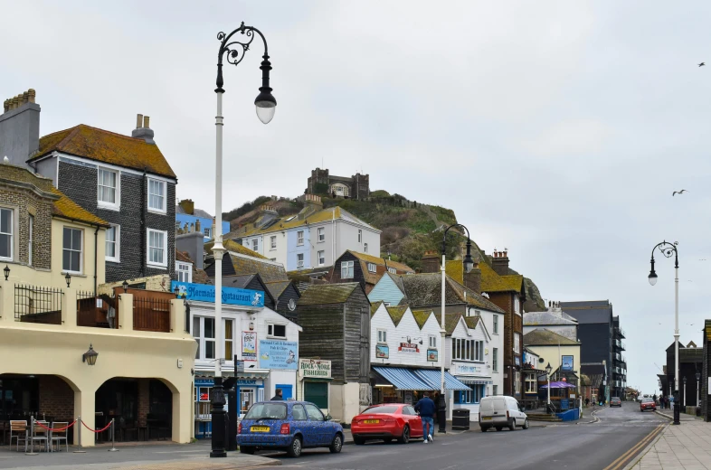 the main street in an old town with several buildings