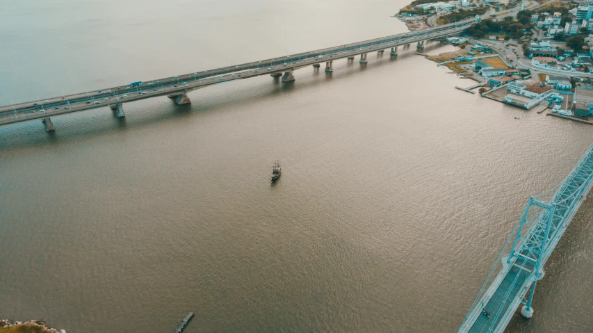 a long bridge spanning across the water