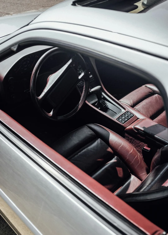 a car dashboard and the front dash line with steering wheel