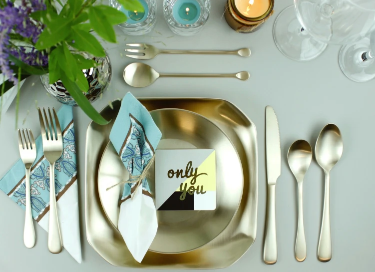 there are place settings laid out on a table