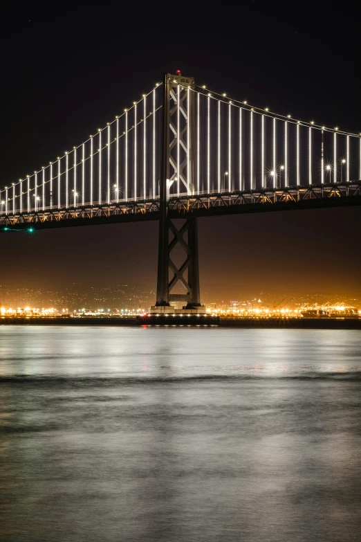 a suspension bridge spanning a large body of water