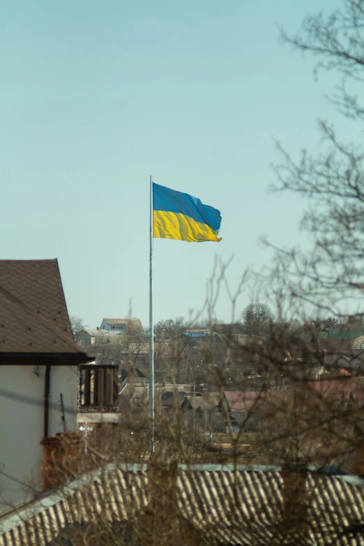 there is a flag on top of a building