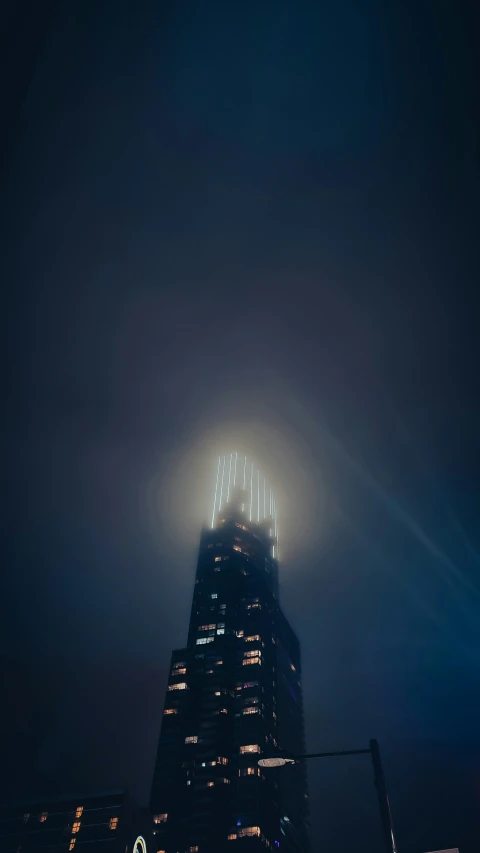 an image of the top of a building at night