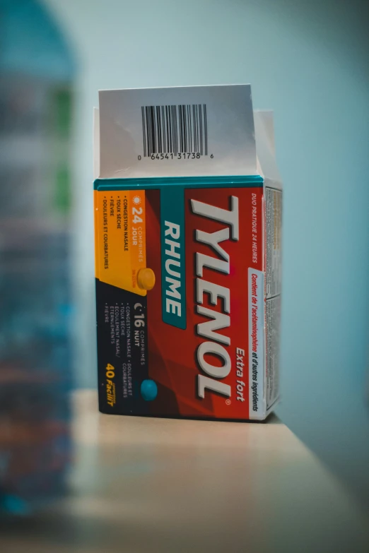 stack of tytonol sitting on top of a table