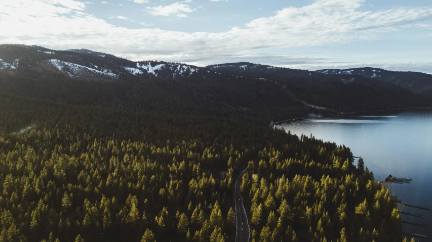 a large lake surrounded by mountains on top of it