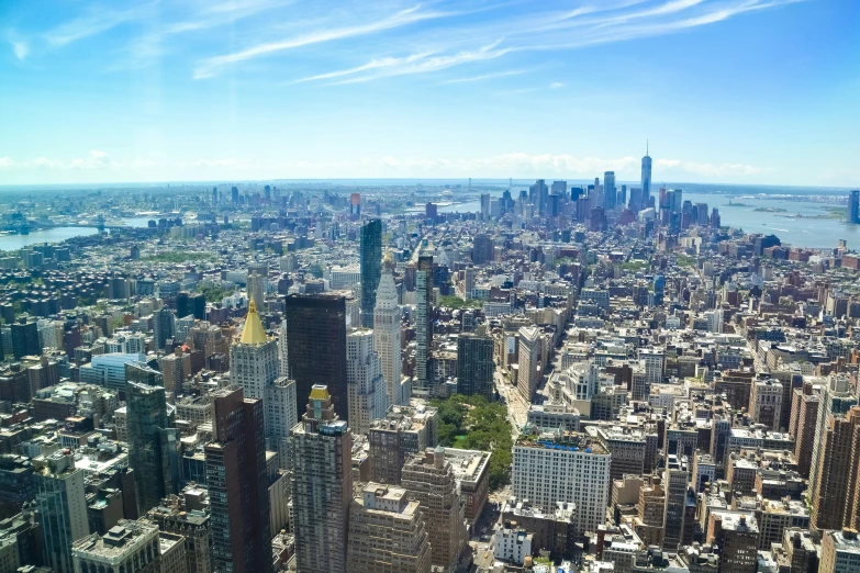 new york city skyline as viewed from the top of a skyscr