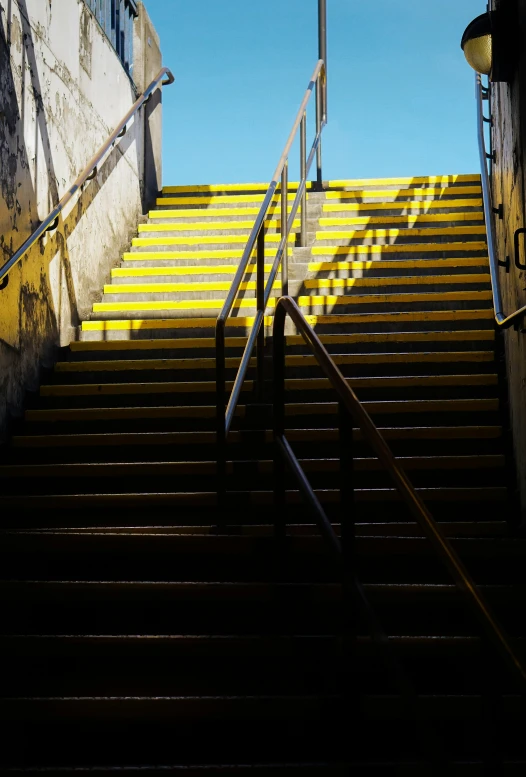 a stairway leading up to the bottom floor of a building