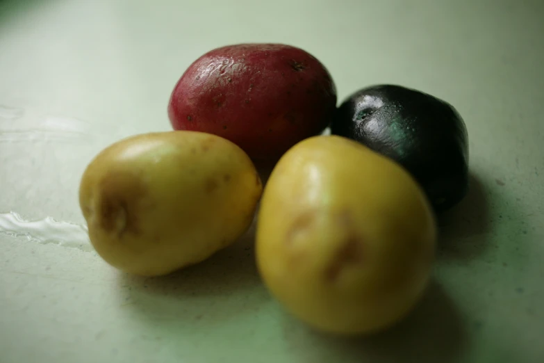 a few small fruit that are on a table