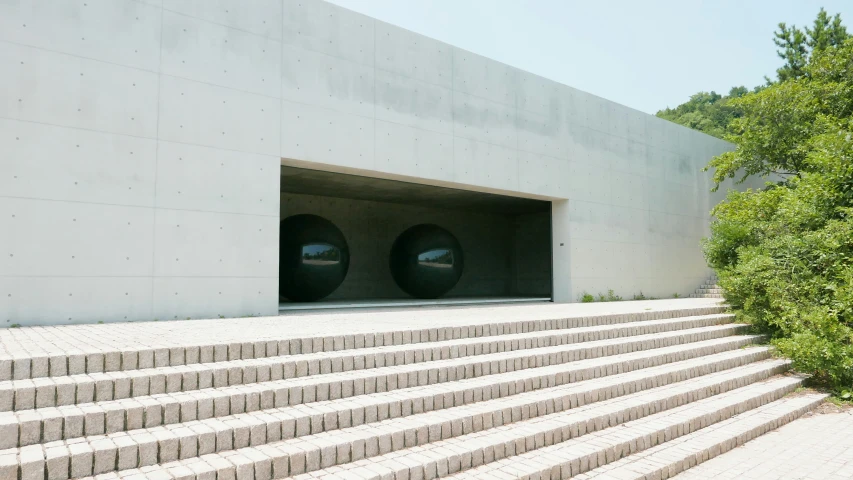 there is some stairs that lead up to the building