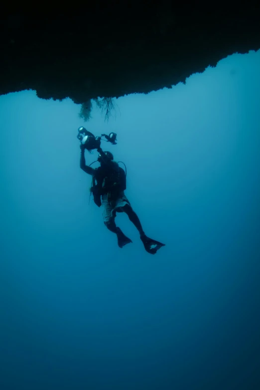 a man is swimming in the ocean