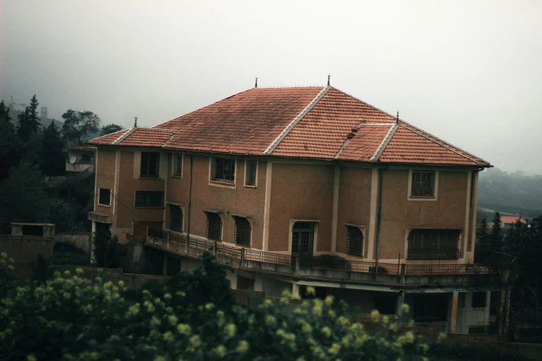 a view of some kind of red tile building