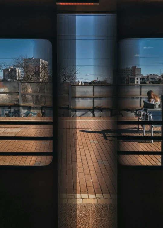 the four different images show two people on benches