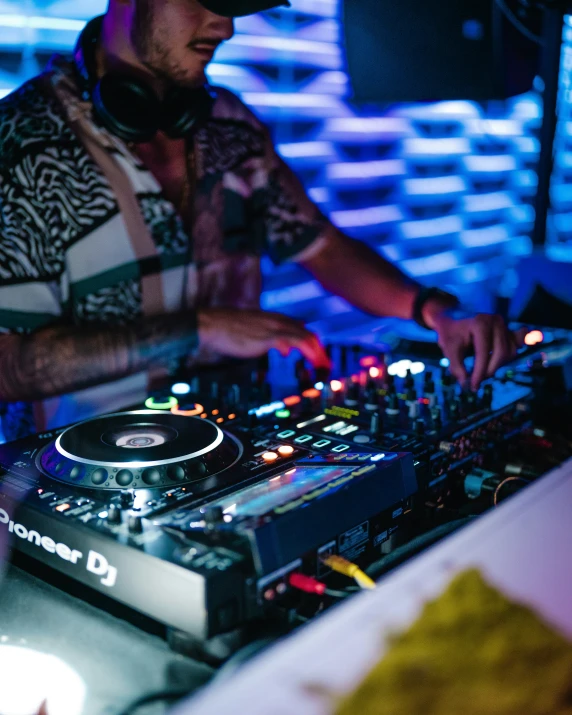 a dj mixing in a very large event