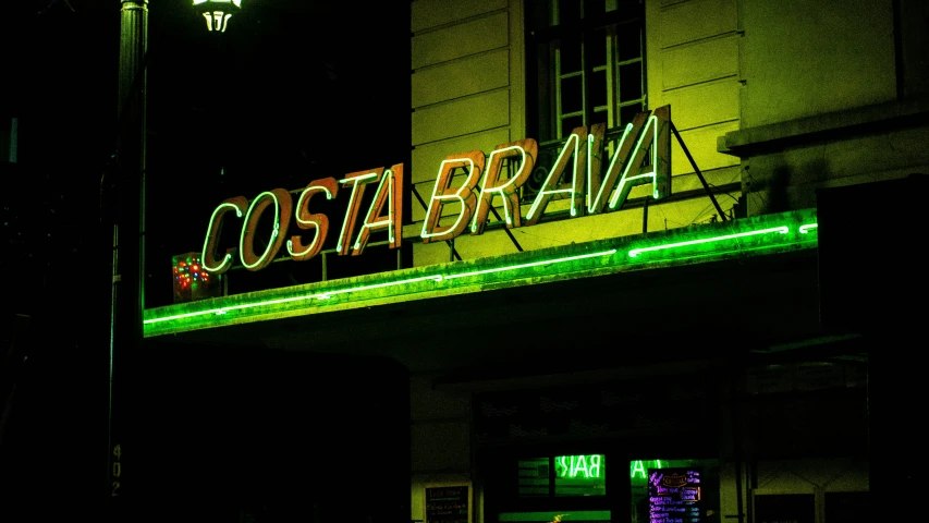 the neon light is on and it says coaarna