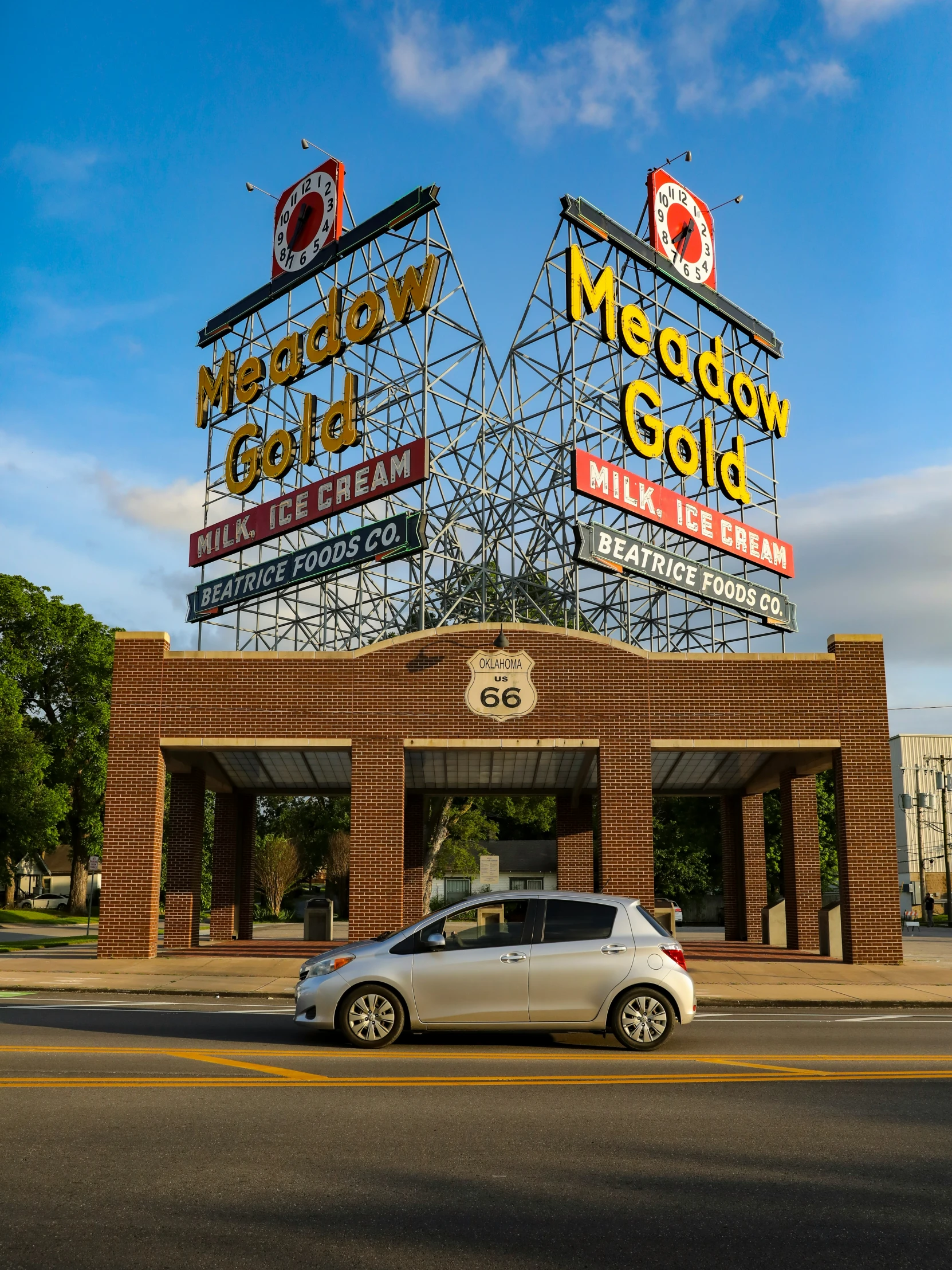 a car is parked outside a show gold establishment