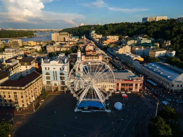 a large ferris wheel in a city street