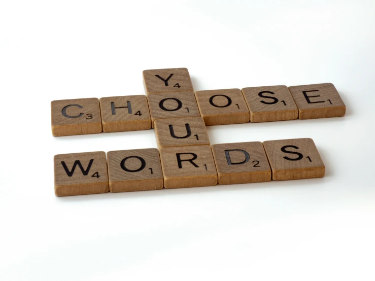 the word choose is spelled with scrabble tiles