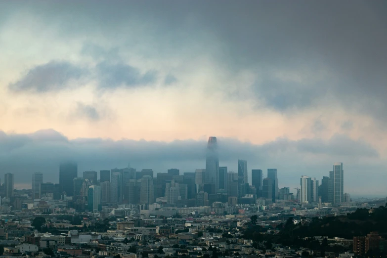 a city skyline with a very large group of tall buildings