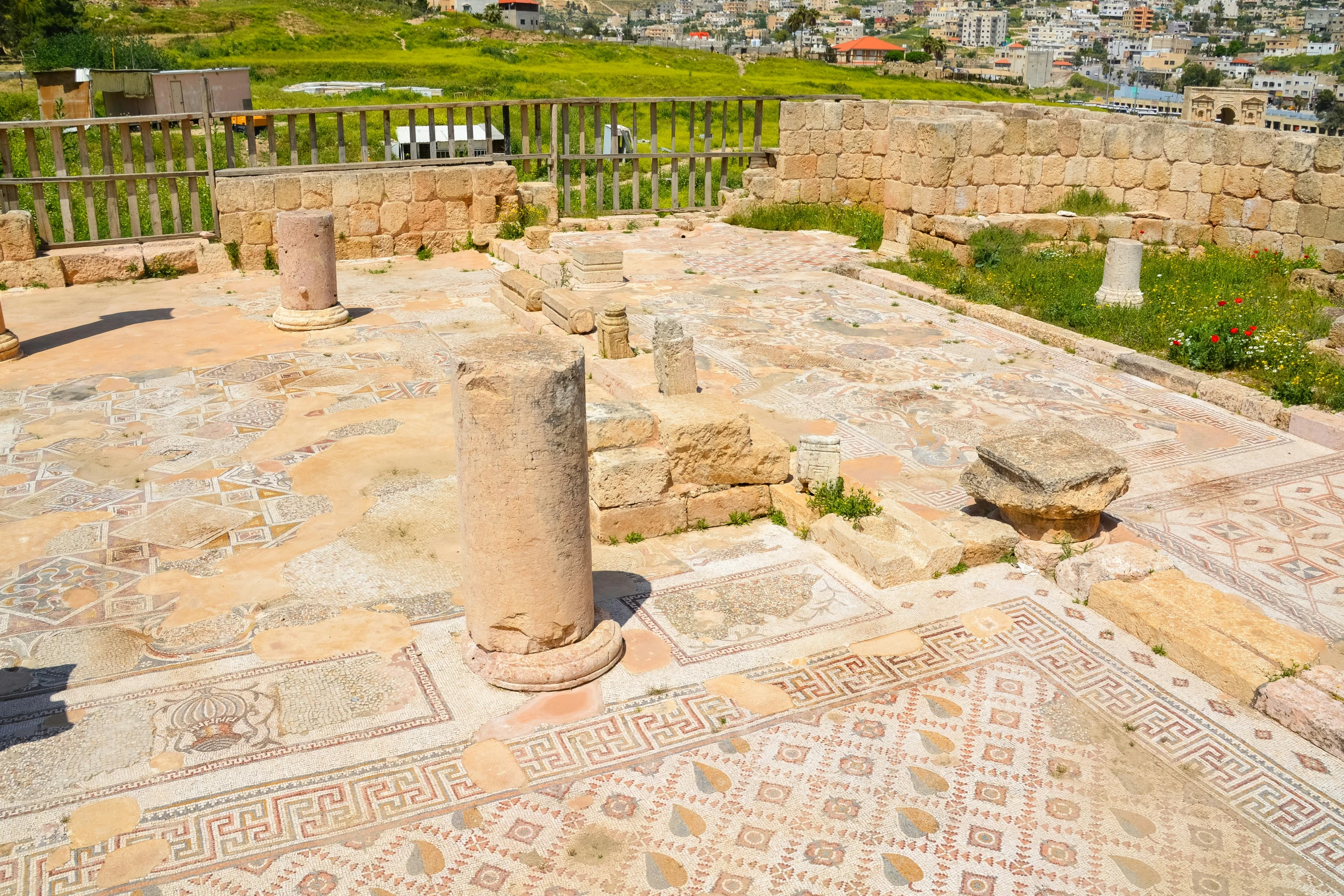 ruins and paintings are dotted in the center of an ancient village