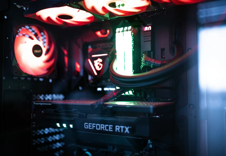 the inside of a large computer case with colorful lights on it