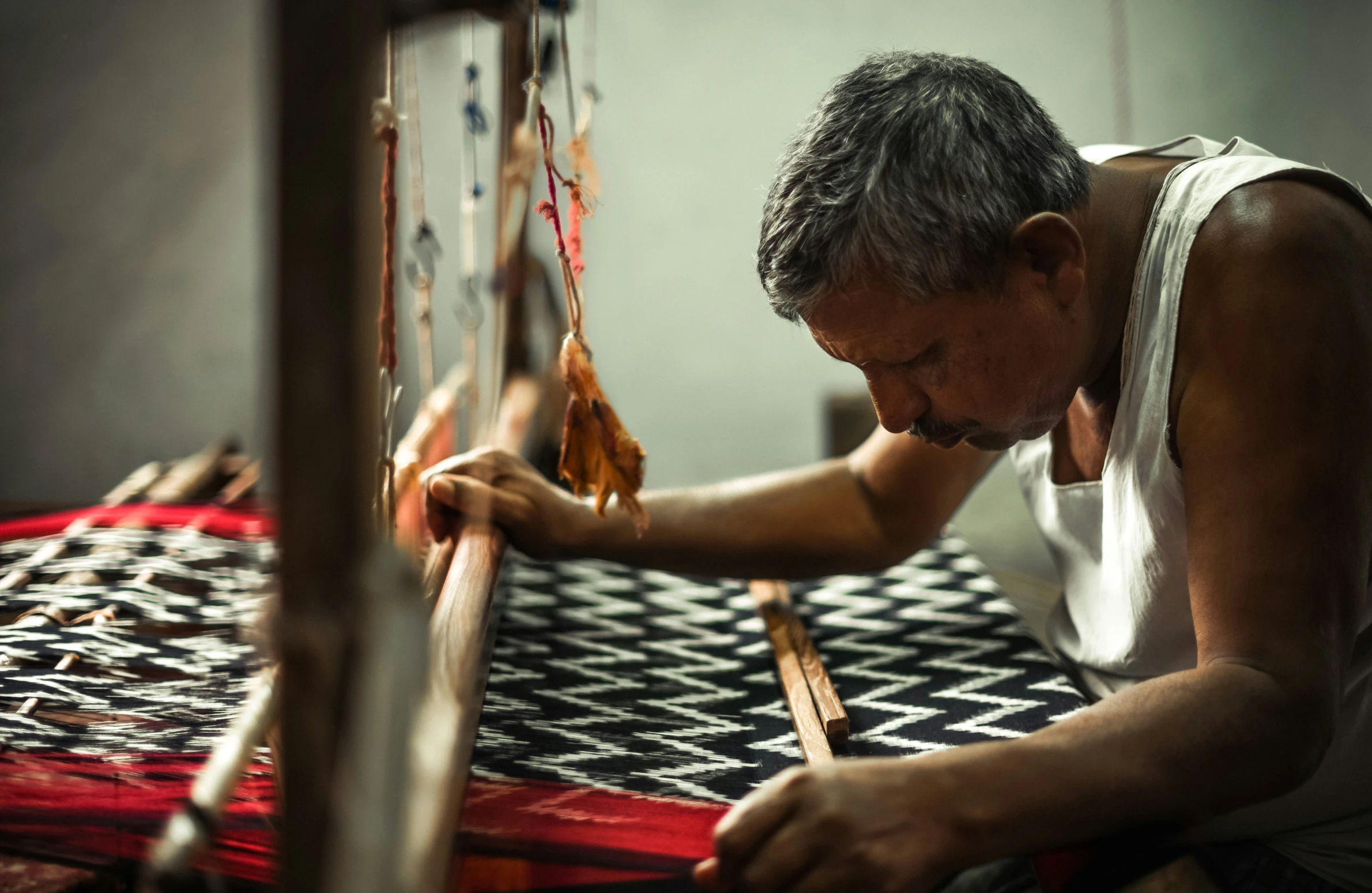 a man is working on an art project