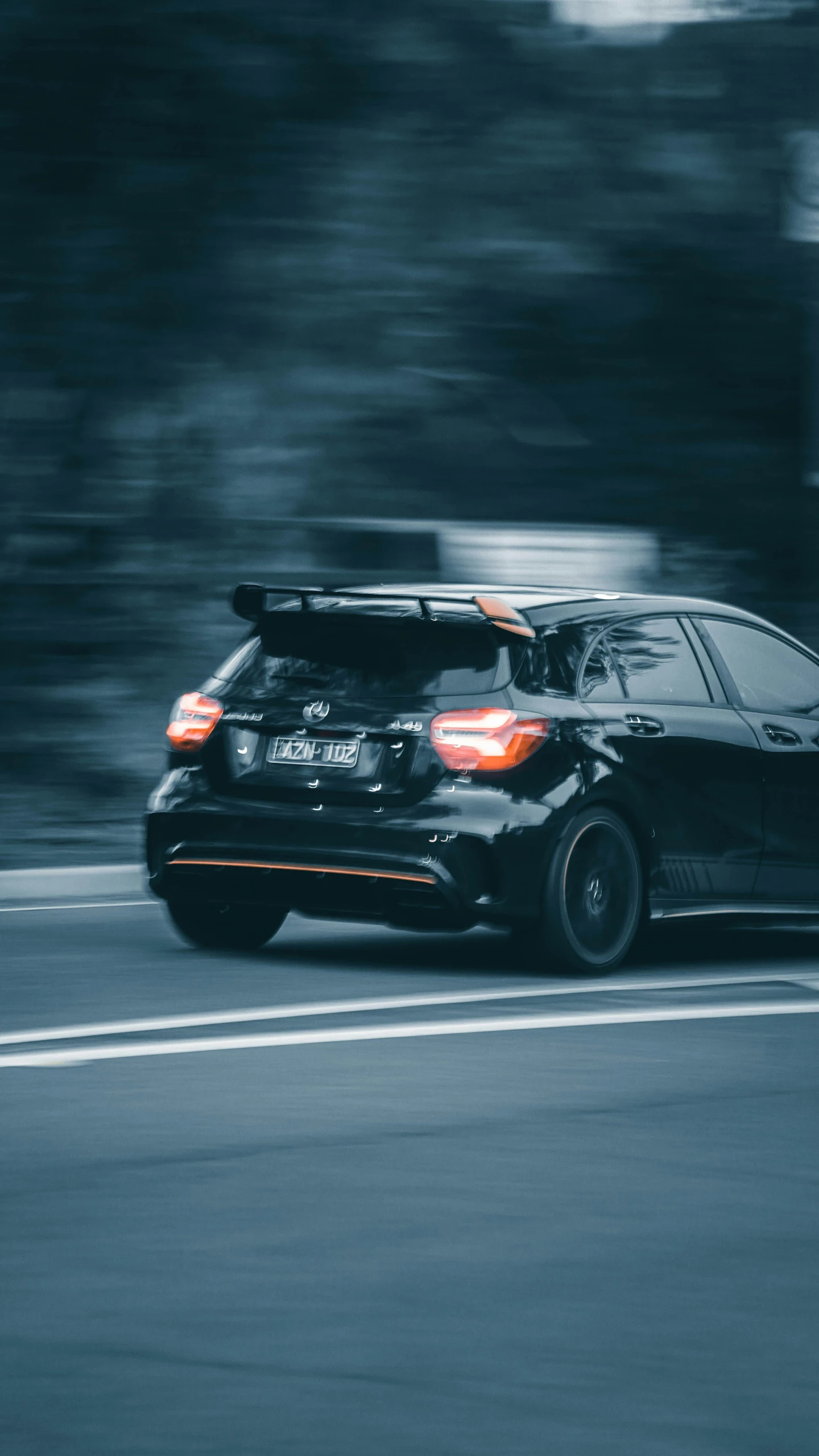 a close up of a car on a road