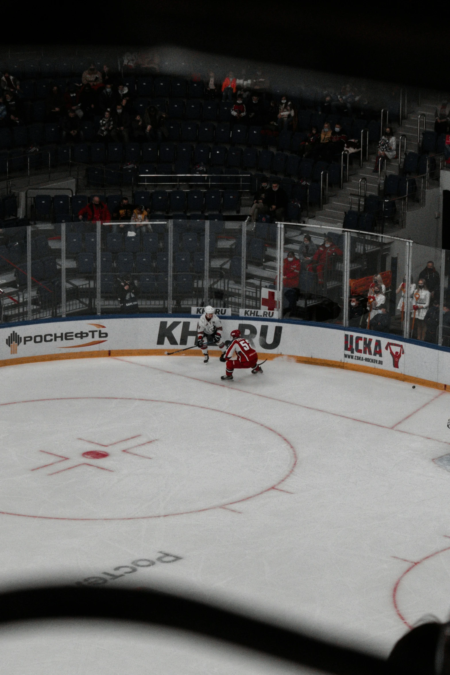 an image of an indoor hockey game being played