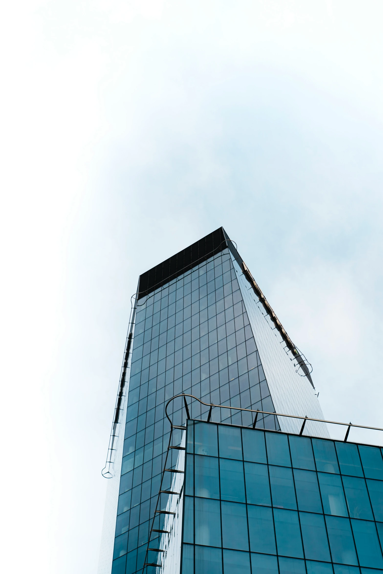 an image of the top of a building with a large window