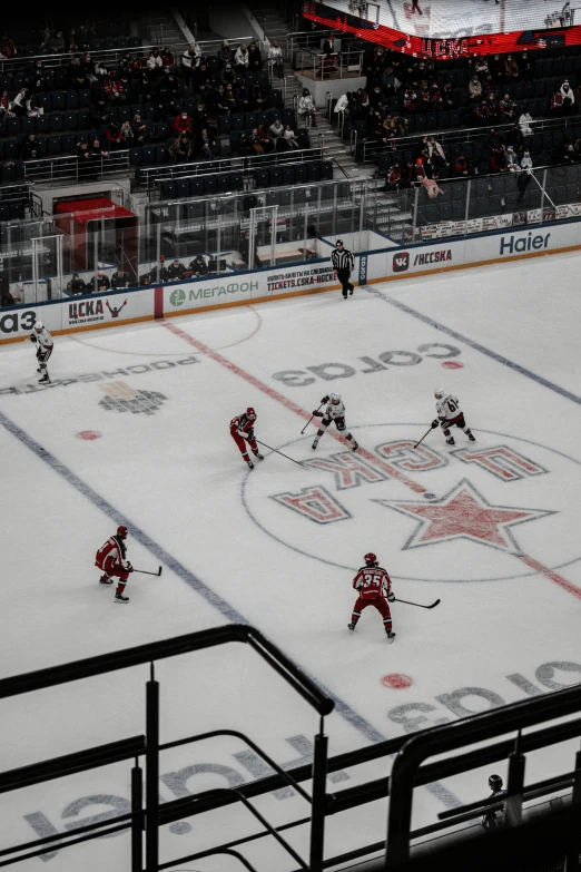 an image of an indoor hockey game being played