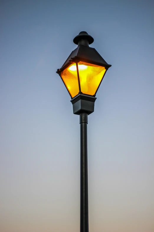 a lamp post with a light in the middle