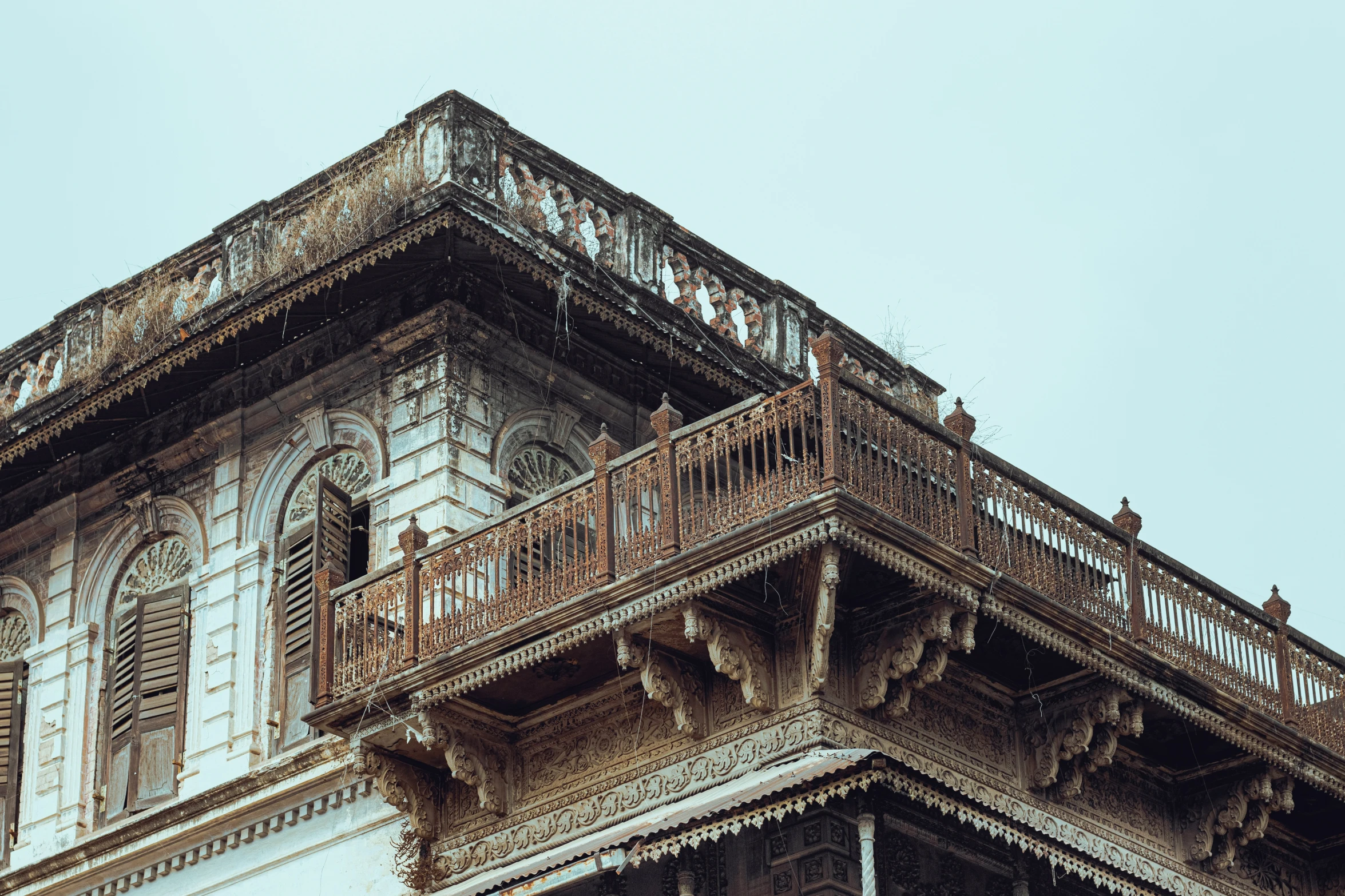 old architecture with balconies on a rainy day