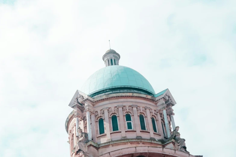 the top of an ornate building with domes