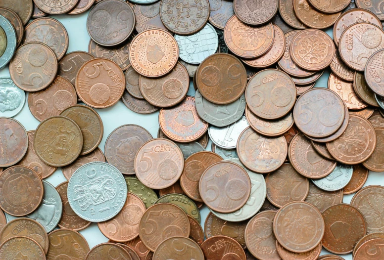 a pile of copper and silver coins