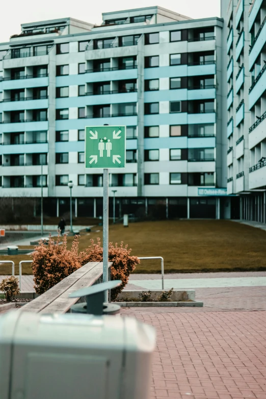 there are a few street signs on the side of the road