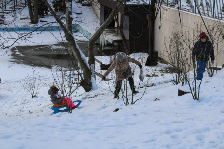 some people on their back in the snow