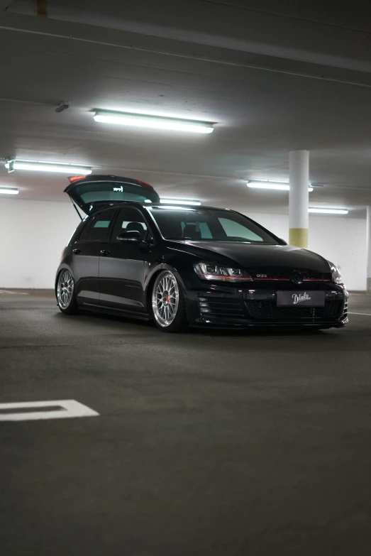 an automobile with a hatchback in a garage