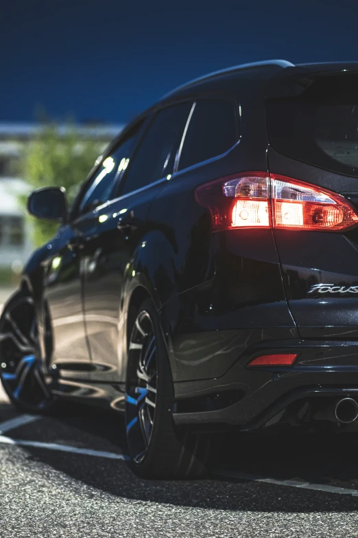 a close up view of a car driving on the road