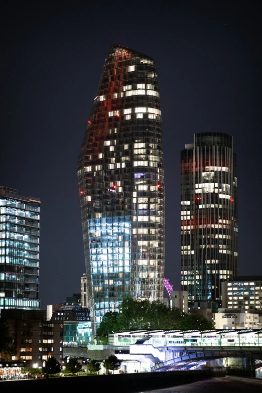 a big building in the middle of a city at night