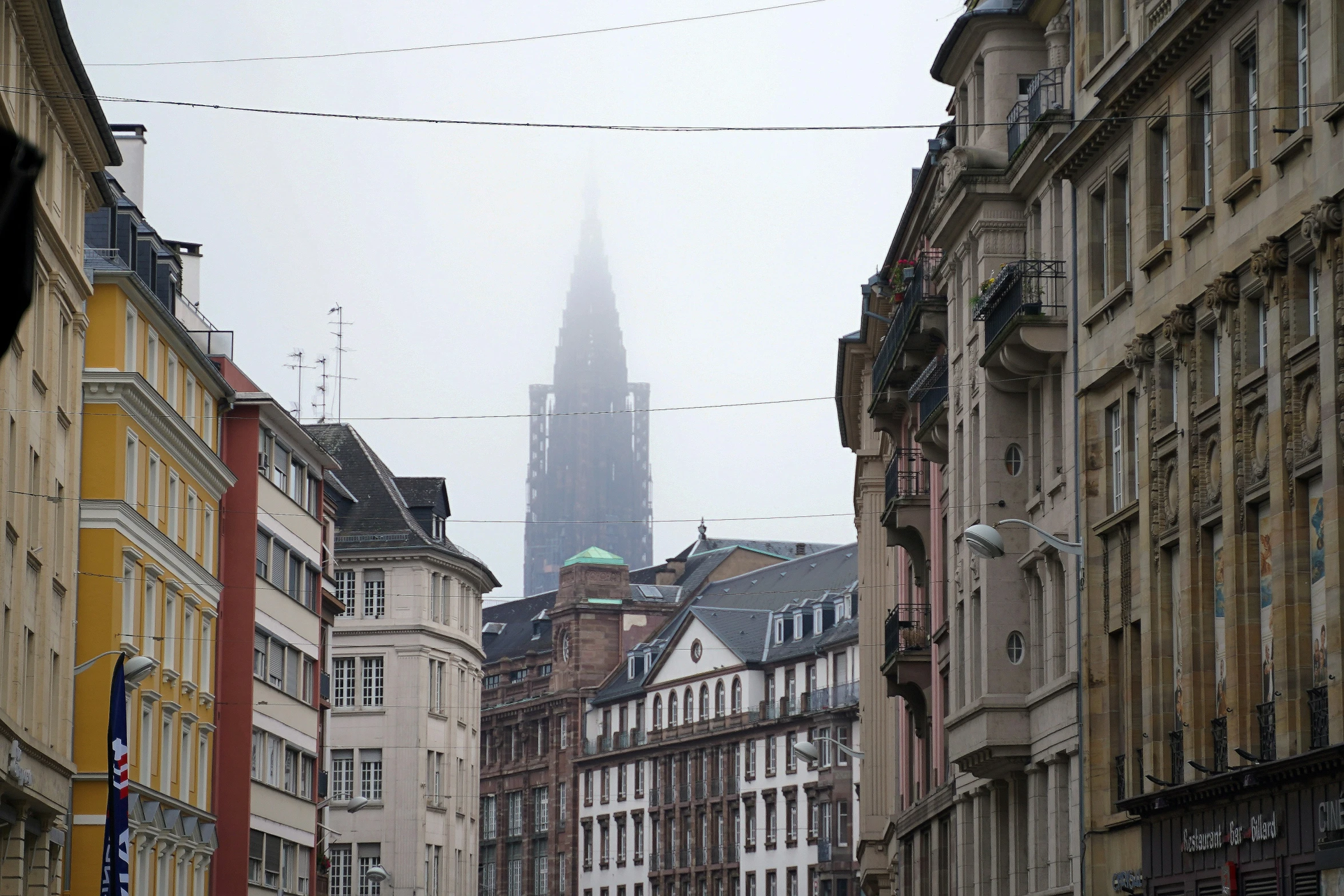 an old city with some tall buildings in the background