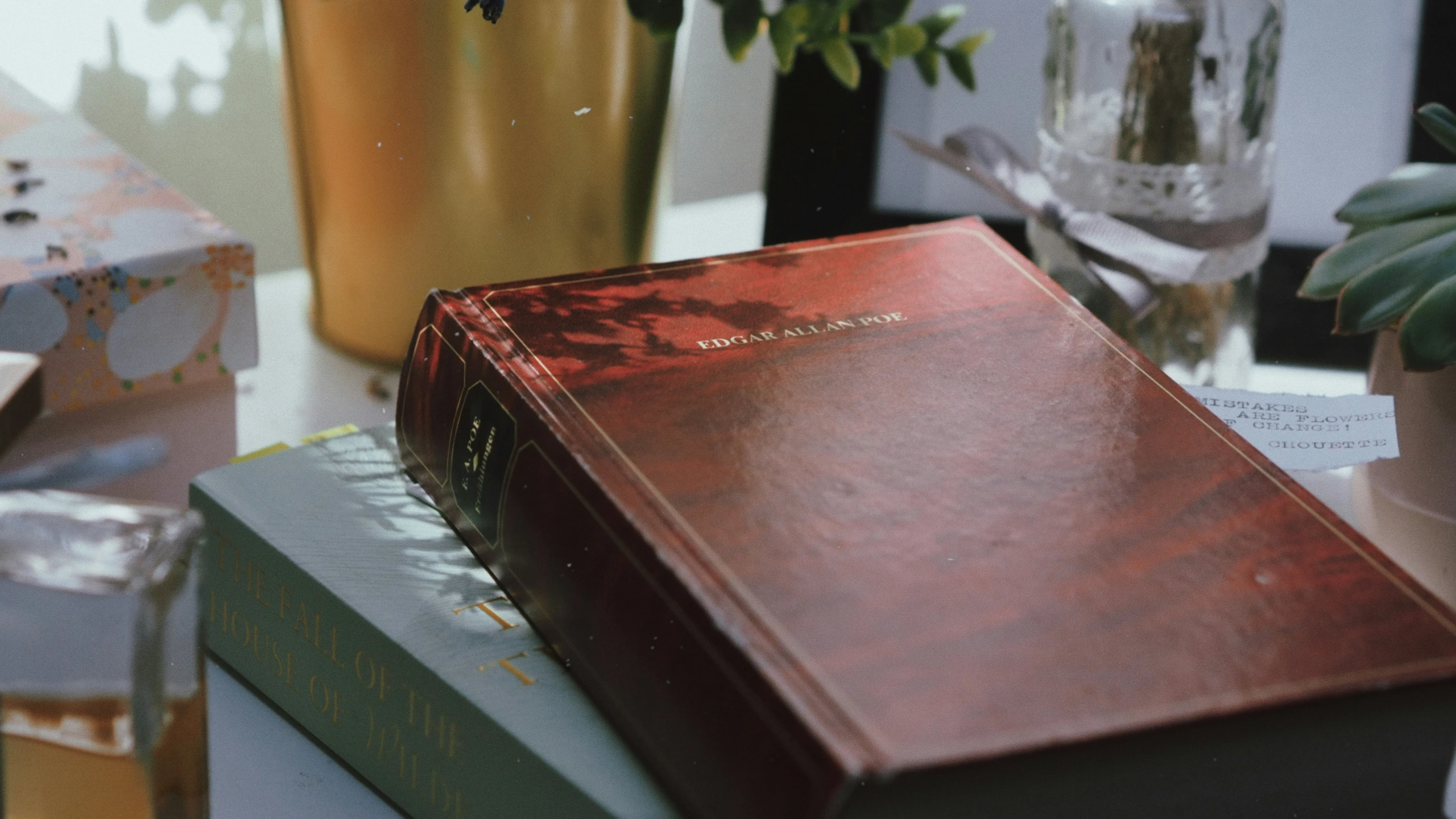 this is a po of a wooden book on top of some other books