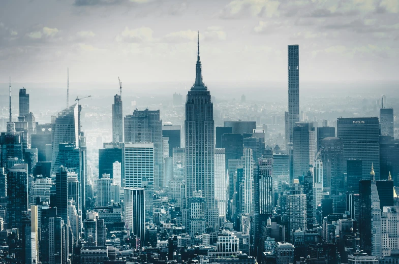 an aerial view of a city with high rise buildings