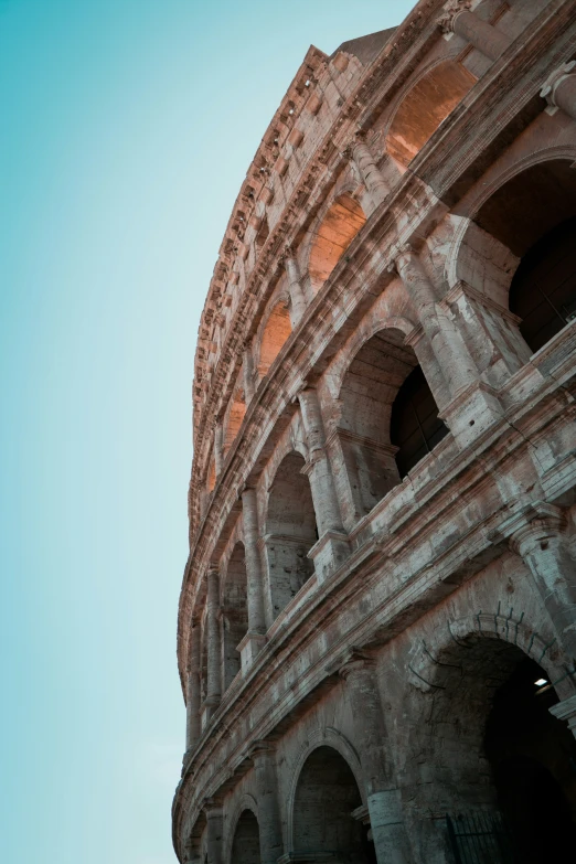 looking up at the base of an ancient building