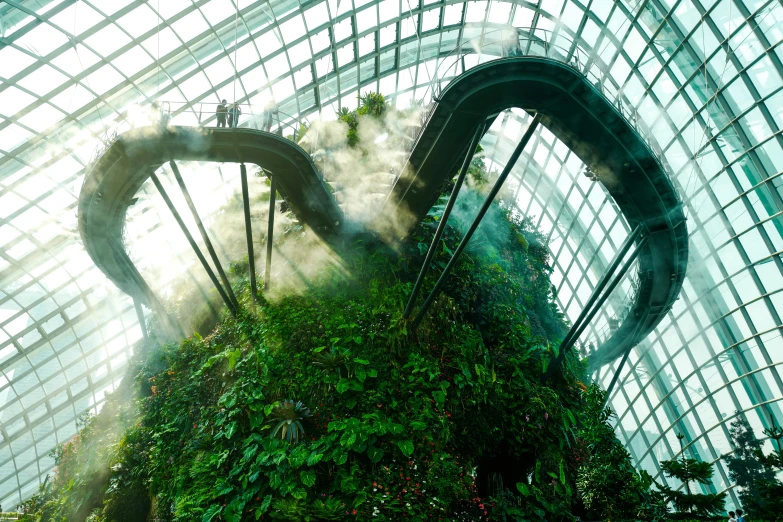 the inside of a building with plants growing inside of it