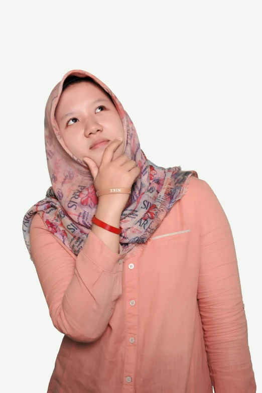 young woman with headscarf looking to the side